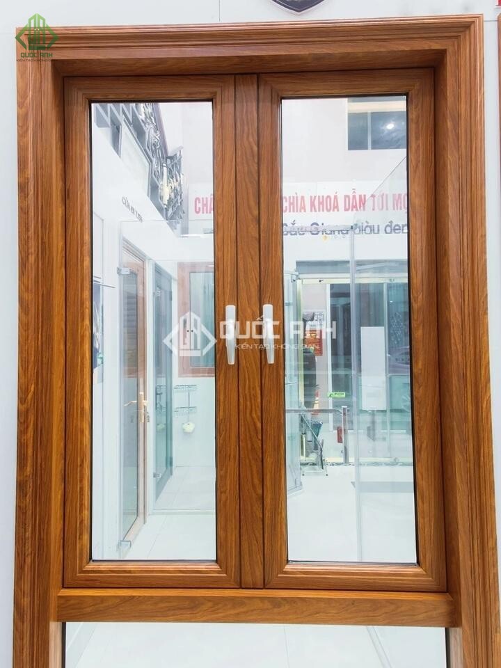 Cửa sổ kính khung nhôm vân gỗ.