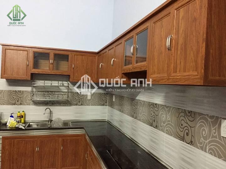 Tủ bếp nhôm giả gỗ. 