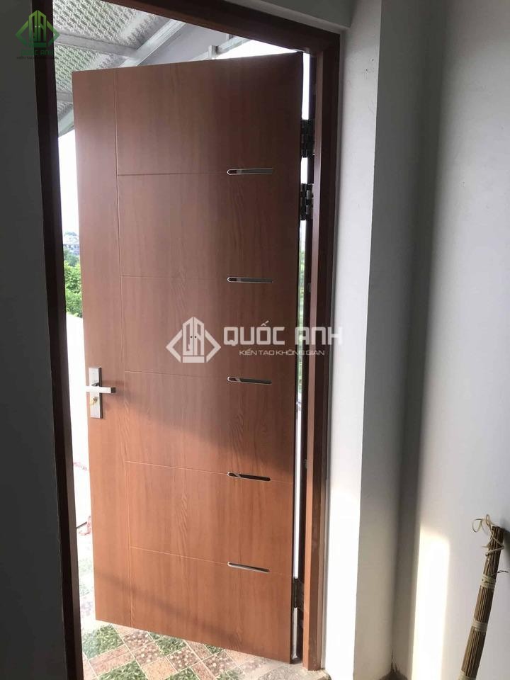 Cửa sắt 1 cánh giả gỗ.